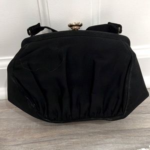 Vintage and rare black Garay evening bag with gold/crystal flower clasp